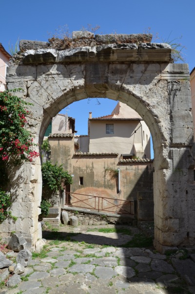 Remaining side of the quadrifrons (four-sided) arch under which lay a well-preserved stretch of the ancient Via Appia, Tarracina (Anxur), Terracina, Italy