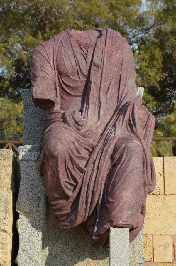 Porphyry statue of Hadrian seated and holding scepter and orb (now missing).