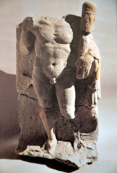 Stela depicting Hercules walking.