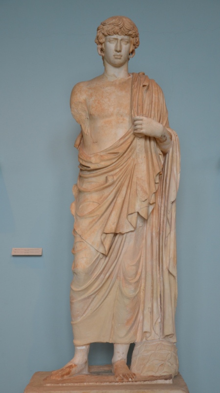 Statue of the deified Antinous represented as Asklepios, found in the outer court of the sanctuary which it apparently adorned, 2nd century AD (Archaeological Museum of Eleusis).