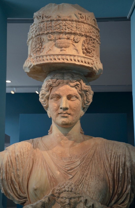The upper part of one of the caryatids that flanked the Lesser Propylaea of Eleusis, made in Attica in about 50 BC (Eleusis Museum).