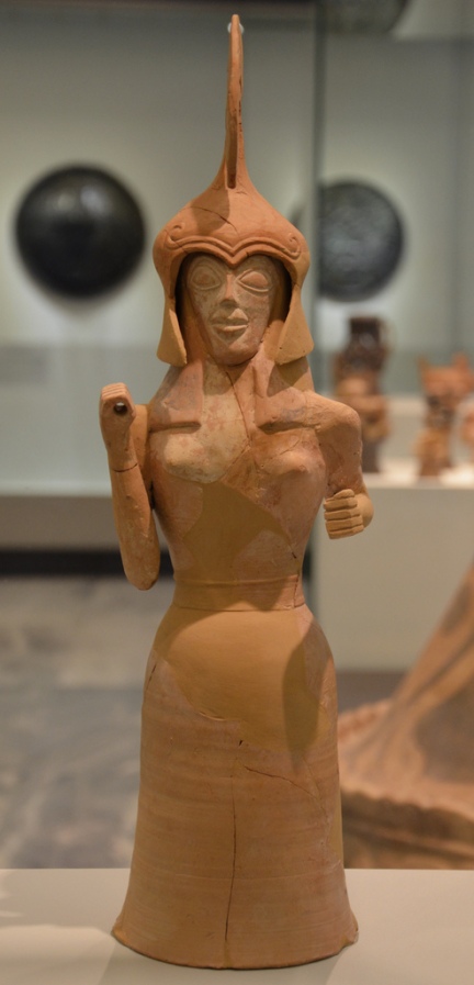 Clay figurine of the goddess Athena. She wears a helmet made separately. She would have held a spear and a shield, the body is wheel-made and the face is moulded. About 660-650 BC.