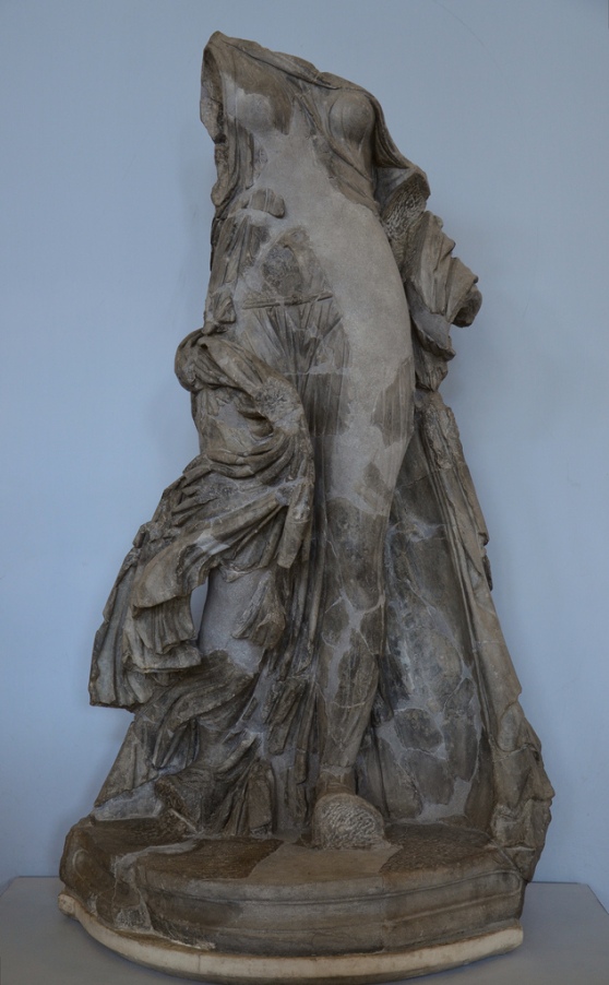 Statue made in dark grey marble (bigio antico) known as the Victory of the Symmachi, probably representing a dancing woman.